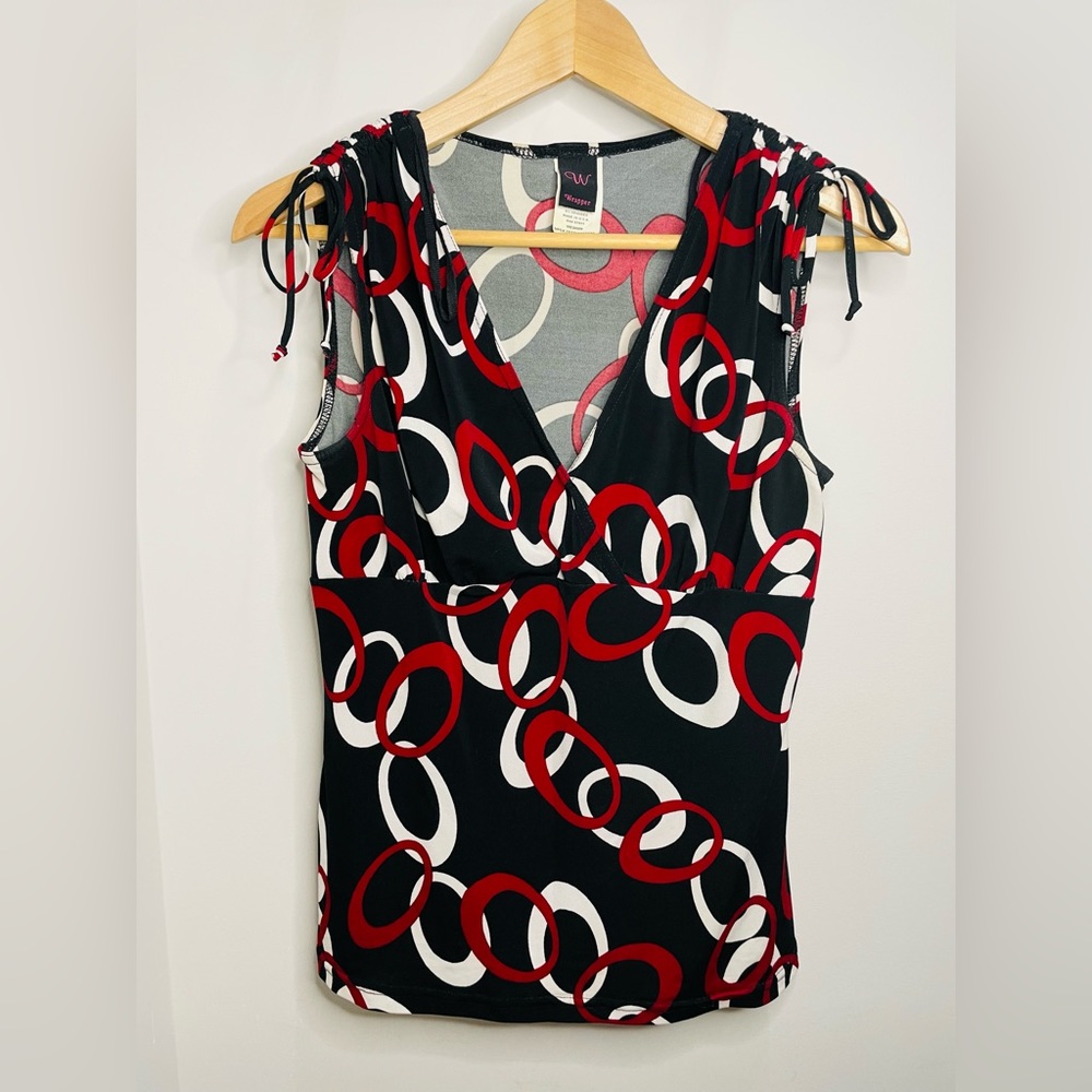 Stretchy top in black, red, and white for work